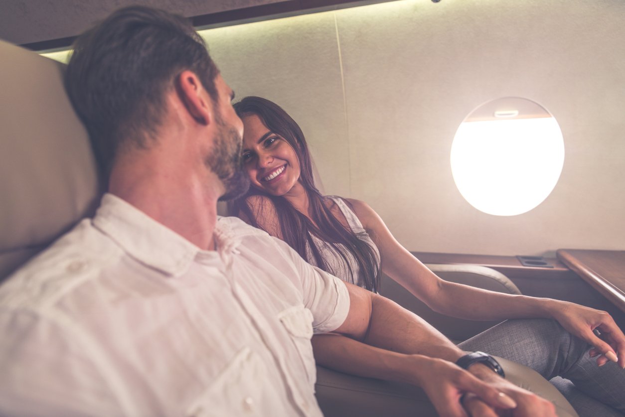 A newlywed couple on a flight bought with their Giftogram gift card